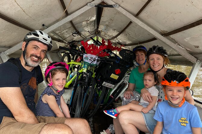 Half-Day Heritage Bike Tour in Kuching - Riding through a Malay kampong