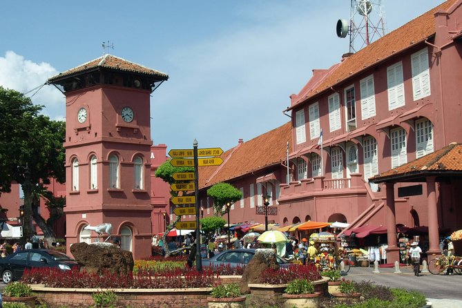 Historical Melaka Day Tour - The road south in an air-conditioned vehicle