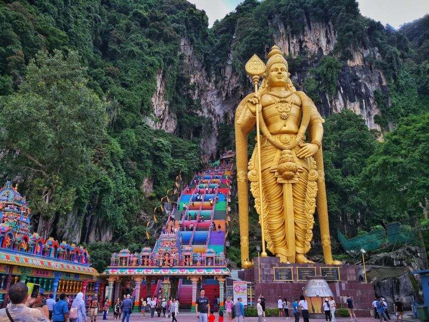 Kuala Lumpur: Batu Caves Half-Day Tour with Pick-Up Option - Arriving beneath the 43-meter Lord Murugan statue