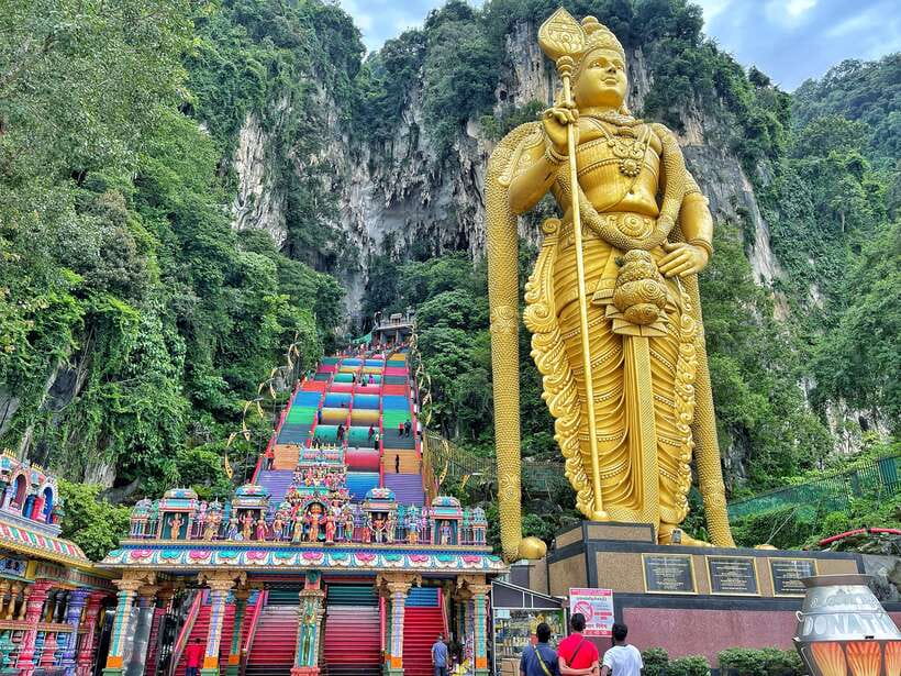 The painted steps and golden statue at Batu Caves, north of Kuala Lumpur