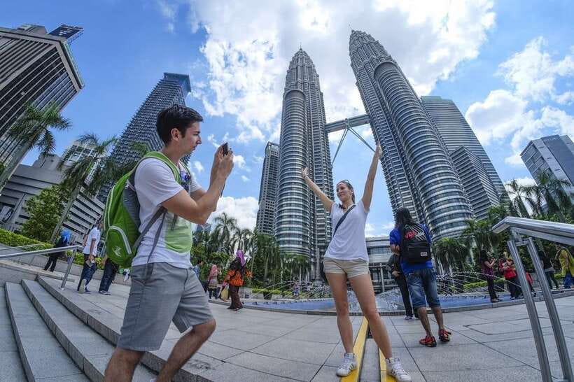 Kuala Lumpur: Half Day Group City Highlights Tour - Perdana Botanical Garden, with limited time