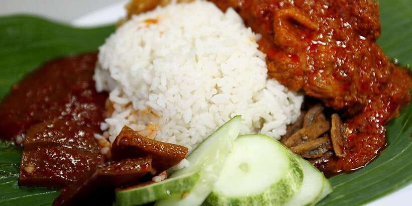 Kuala Lumpur: Half Day Local Food Walking Tour - The short train ride to Kampung Baru