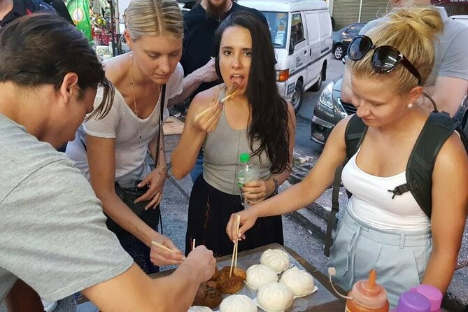 Kuala Lumpur Walk, Eat & See Tour - Petaling Street finishes with food, murals, and change