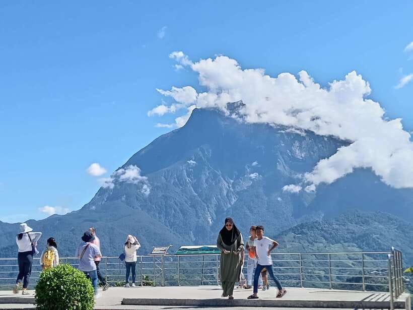 Kundasang : Poring Hot Spring + Desa & Meal Shared Tour - Poring Hot Springs: warm water and a forest walk