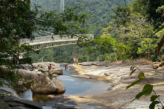 Telaga Tujuh Waterfall Half Day and Sacred Blue Pool Tour - Swimming at the Blue Pool